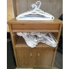 Image 1 : Small Shelf Or Cabinet With Door & Large Amount Of White Clothing Hangars  25w x 13d x 35 tall