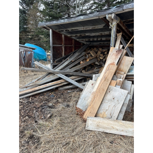  large selection of usable, Barnwood plywood, and a massive stack of firewood. Buyer must take all