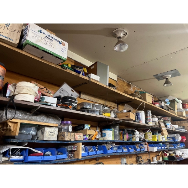 4 shelves, full of miscellaneous screws, tape electrical items and so much more also includes all th