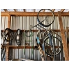 Image 1 : . Bike, cords, belts, chains, and miscellaneous parts Everything on the wall

