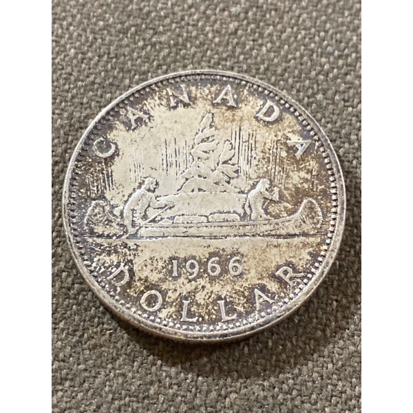 1966 Canadian Silver Dollar Coin Featuring Voyageurs and Queen Elizabeth II