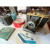Image 3 :  2 vintage cameras, and tins with a perfume  bottle.