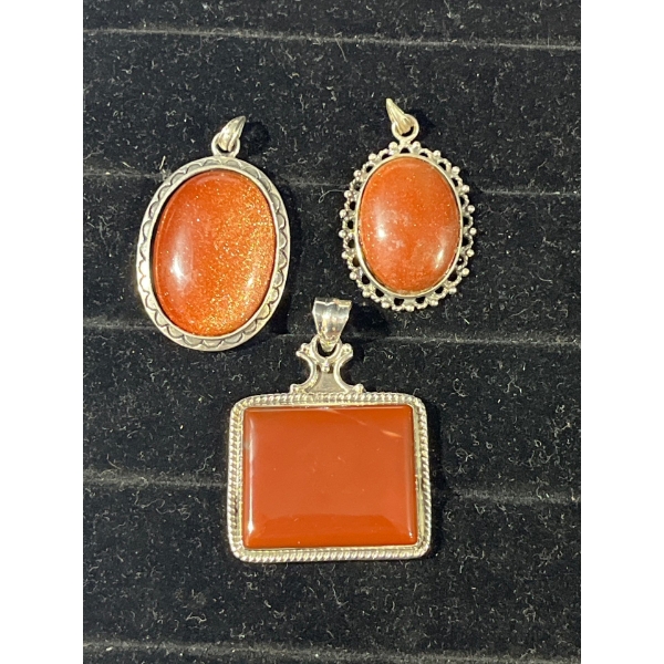 Collection of Orange Stone Pendants
