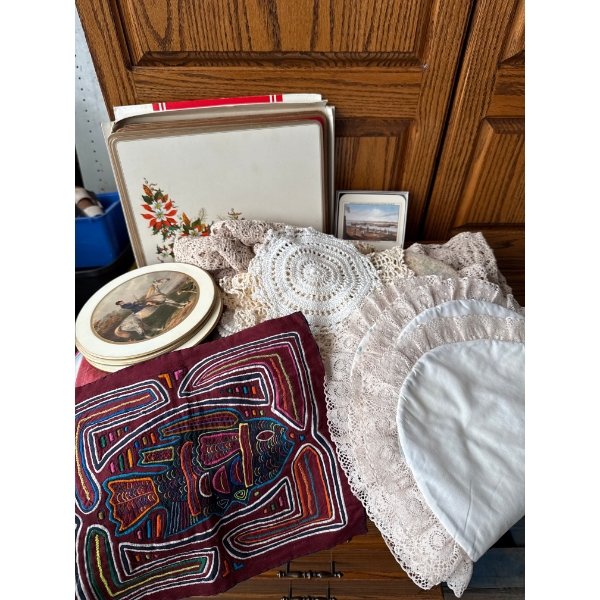 Hand embroidered doilies, coasters and placemats