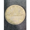 Image 1 : 1958 Canada Silver Dollar Featuring Queen Elizabeth II and Voyageur Design