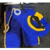 Image 7 : Hand-Crocheted Baby Clothes Collection Featuring Unique Designs