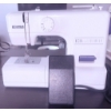Image 1 : Kenmore Sewing Machine with Foot Pedal and Assorted Sewing Patterns