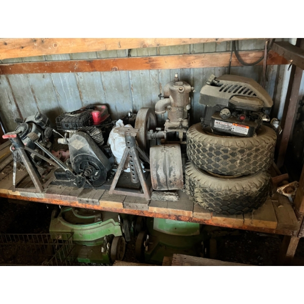  Tires, lawnmower motors, jacks Bottom left shelf.