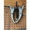 Image 3 : pegboard with various tools, including bolt cutters gear, polars, hacksaw, bungee cords, vice grips,