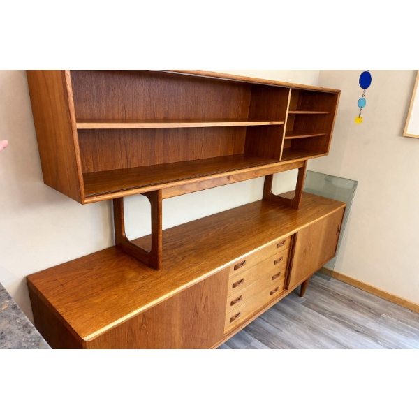 Vintage teak, buffet, & Hutch in amazing well kept condition with lots of close able storage. This b