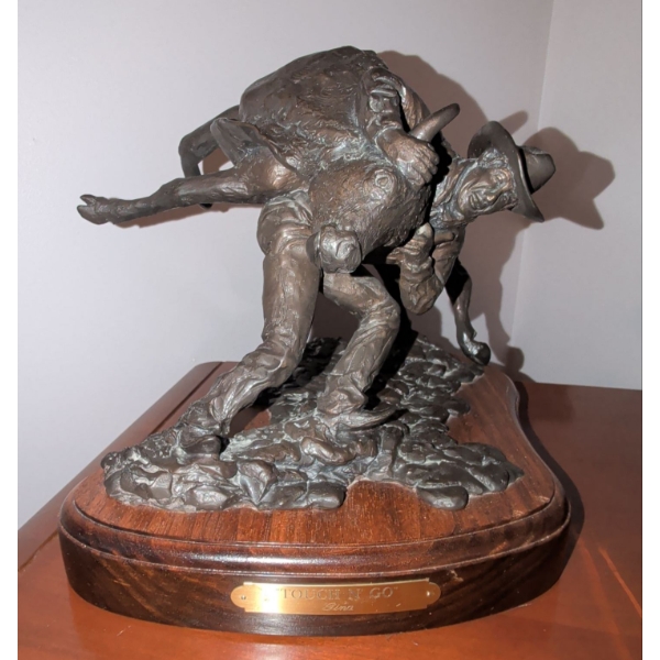 "Touch N' Go" Bronze Statue