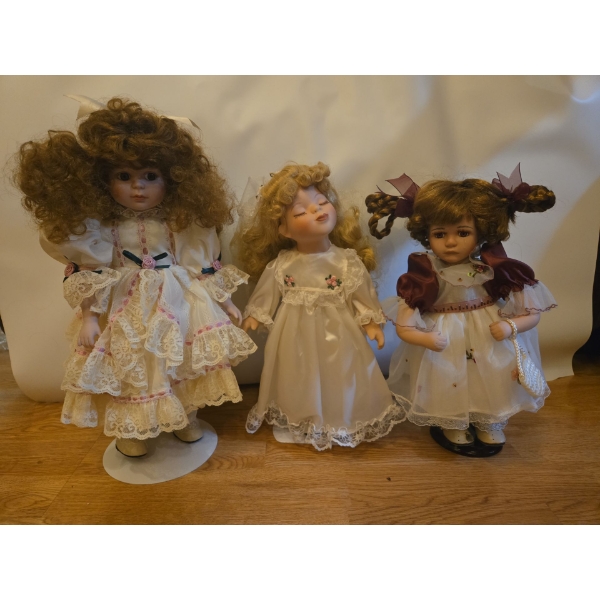 Doll Collection: Crying Doll, Goodnight Kiss Doll, Event Doll. Tallest is 16T 