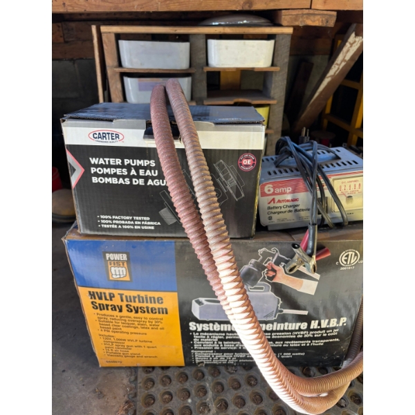 Turbine air sprayer system with battery charger hoses and a box full of miscellaneous wire and charg