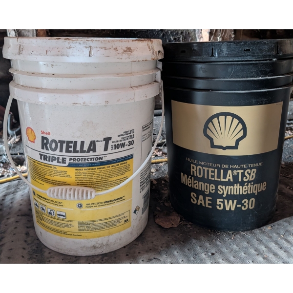 New Shell Rotella Heavy Duty Diesal Engine OIl - Left Triple Protectopm 15W-40 Right-Synthetic 