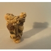 Image 2 : Hard Carved Bone Ivory Frisky Figures & Infant Holding Chinese Yen Currency 2.5T