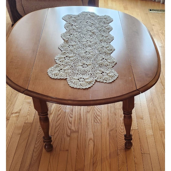 Oval Wood Coffee Table with Expandable Sides