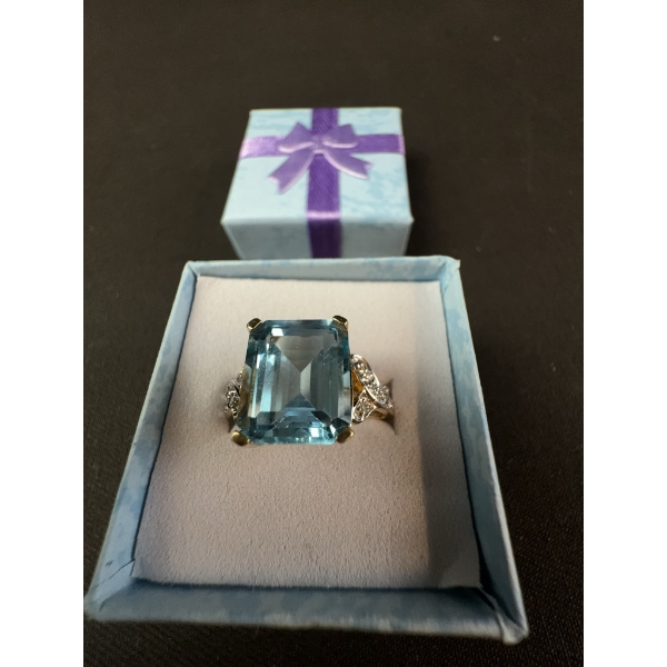 Gold Ring with Large Blue Gemstone