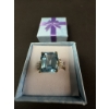Image 1 : Beautiful emerald-cut topaz ring with small accent diamonds set in 10K gold