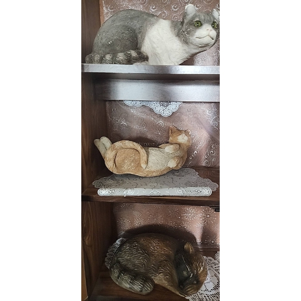 Two Sandicast Outdoor Cat Decor and One Ceramic Raccoon