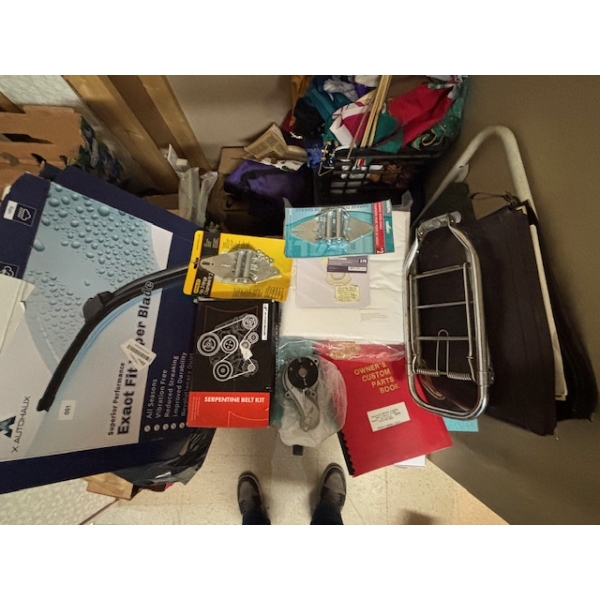 collection of vintage repair manuals, Massey Ferguson, John Deere new Holland, along with wiper blad