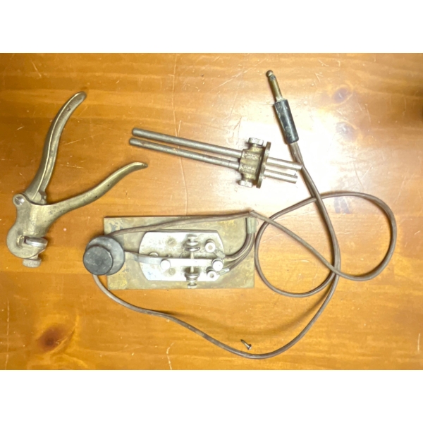 Morriscode Transmitter And Antique nail Clippers.