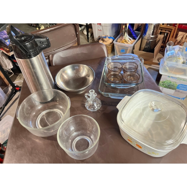 Coffee thermos variety of mixing bowls  glass oil and vinegar  large baking pot, some casserole dish