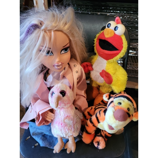 Stuffed Animals and Bratz Doll Dressed in Harley Davidson
