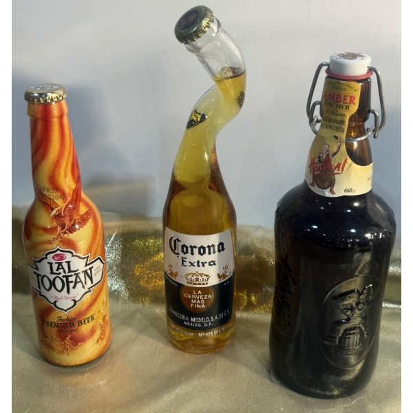 Three Unique Beer Bottles, Including Corona Extra with Twisted Design
