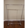 Image 1 : Chrome Rolling Rack, Adjustable Height, Pictured: 46 W, 23 D, 66 T 