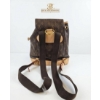 Image 4 : Louis Vuitton Monogram Canvas Backpack with Leather Accents
