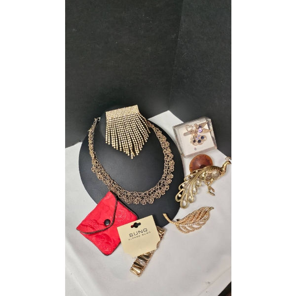 Vintage Costume Jewelry Set Featuring Necklaces, Brooches, and Bracelets