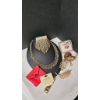 Image 1 : Vintage Costume Jewelry Set Featuring Necklaces, Brooches, and Bracelets