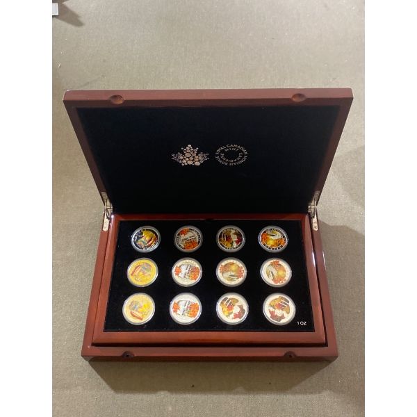 Twelve Canadian $20 Fine Silver Coins in Presentation Box, Dated 2013-2015