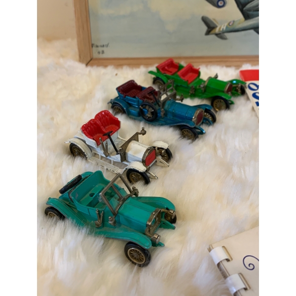 Collectibles Including WWII Plane Artwork, Model Cars, Coins, and Memorabilia