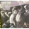 Image 5 : Records: Wham!, Men at Work, A-ha