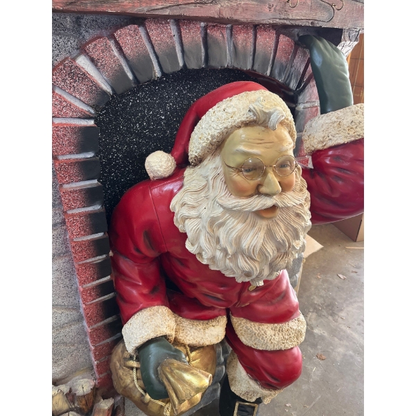 amazing Santa coming out of the fireplace sculpture 60”tall
47” wide