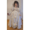 Image 1 : Porcelain Doll in White on a Wooden Base, 22T 