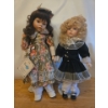 Image 1 : Porcelain Dolls: Vanessa in Floral & Emerald Girl. Tallest is 20T 