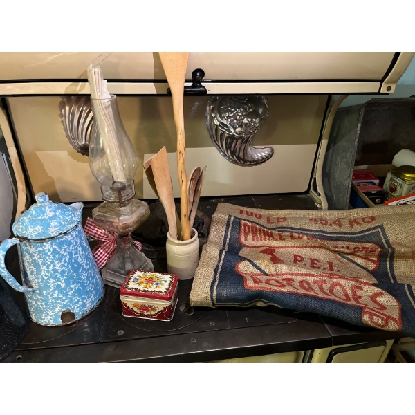 Antique glass lantern small clay pottery with antique wooden spoons two enamel coffee, pots, one bab