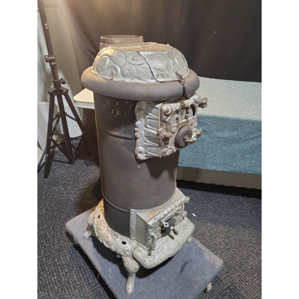 	Cast Iron "Potbelly" Stove (Not Fire Safe Guaranteed)