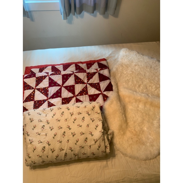 Three:Handmade Patchwork Quilt, Floral Comforter, and Sheepskin Rug