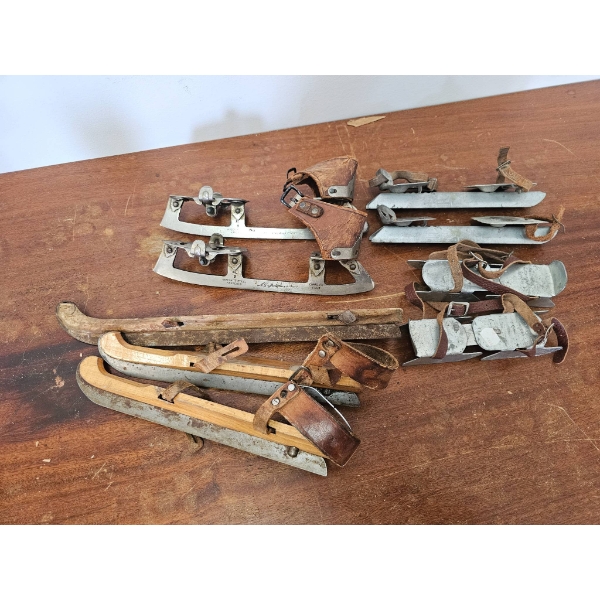 Vintage Ice Skates with Leather Straps and Wooden Components