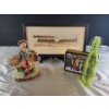 Image 1 : Decorative Delights- Porcelain Figurine, Decorative Bottle, Framed Landscape Bin, and a Tin
