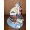 Image 1 : Ceramic Figurine of Man Sitting at River's Edge 6 T