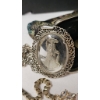 Image 6 : Vintage Jewelry and Collectibles Including Necklace, Brooches, and Stamps Tokens in Clutch Purse