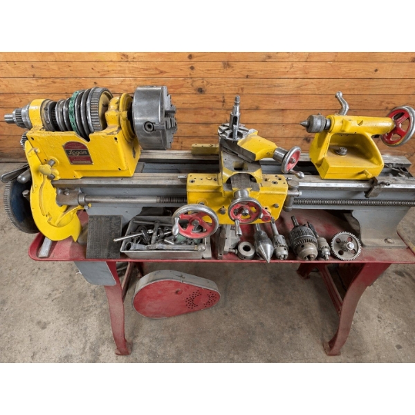 Logan metal lathe with all accessories and attachments with a 3/4 Hp electric motor with 220 plug so