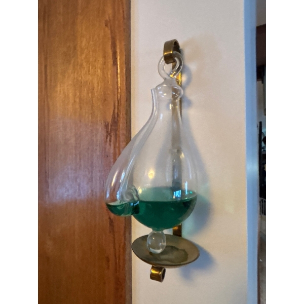 Goethe barometer, also known as a storm glass or water barometer.