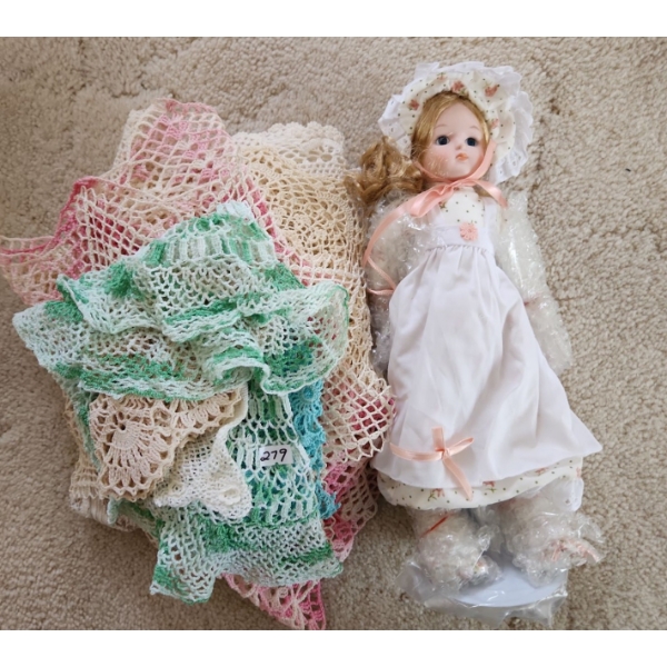 Porcelain Doll and Doilies