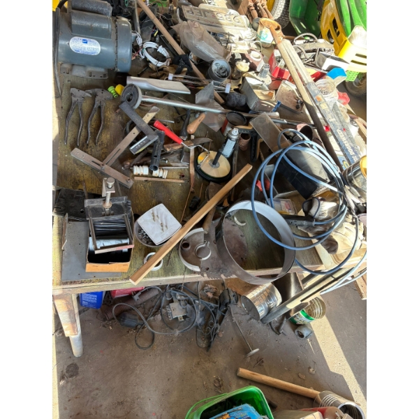 shop table with electric motors, Arius tools, pipe vintage license plate, plates, axis sledgehammer 
