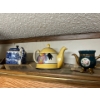 Image 4 : Collection of tea pots cookie Jars & various tin canisters .